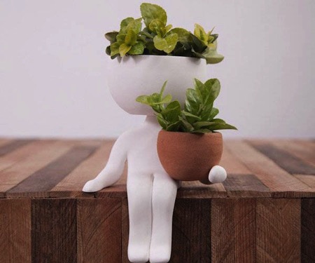 萌態(tài)十足的娃娃創(chuàng)意花盆